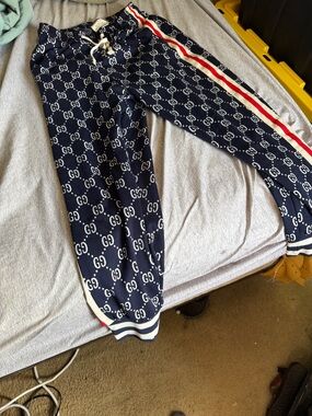 Gucci navy blue GG monogram track pants with red and white side stripe